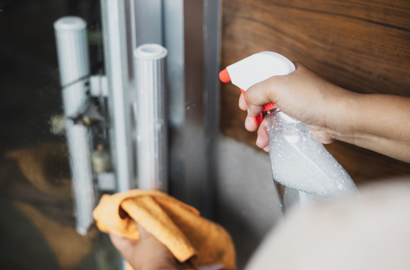 A Sunshine Clean Pros team member performing cleaning services in Hopewell, NJ, demonstrating the convenience and quality of local expertise.