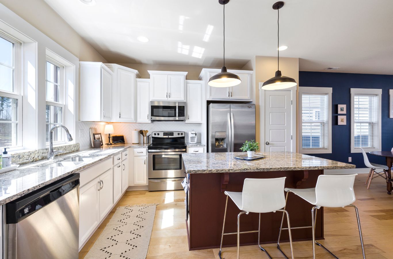 Sunshine Clean Pros team member performing house cleaning services in South Jersey, focused on a sparkling clean kitchen that showcases the value of expert care.