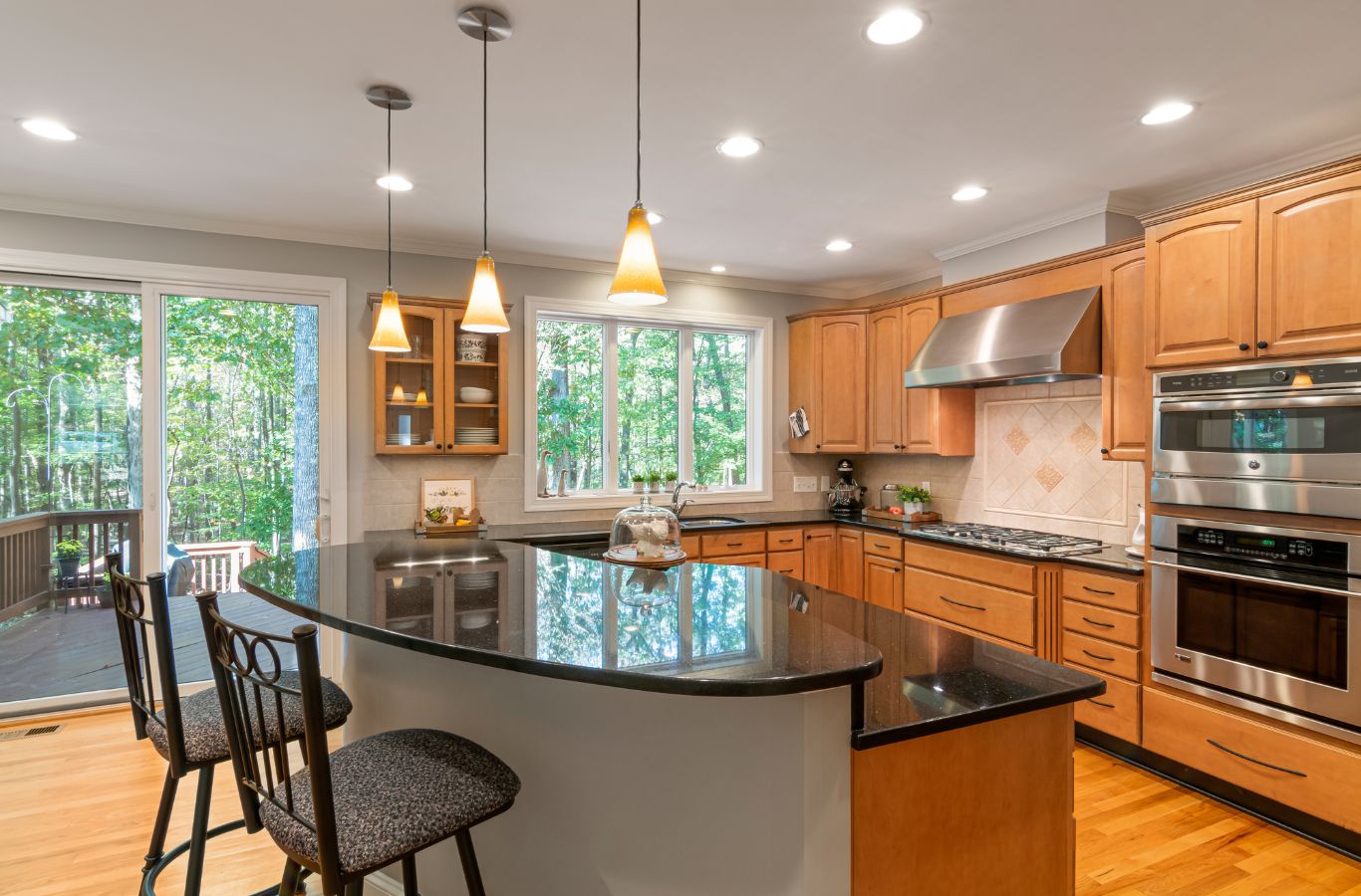 Sunshine Clean Pros team member delivering house cleaning services in Voorhees Township, NJ, focused on a sparkling clean kitchen that highlights the benefits of local expertise.