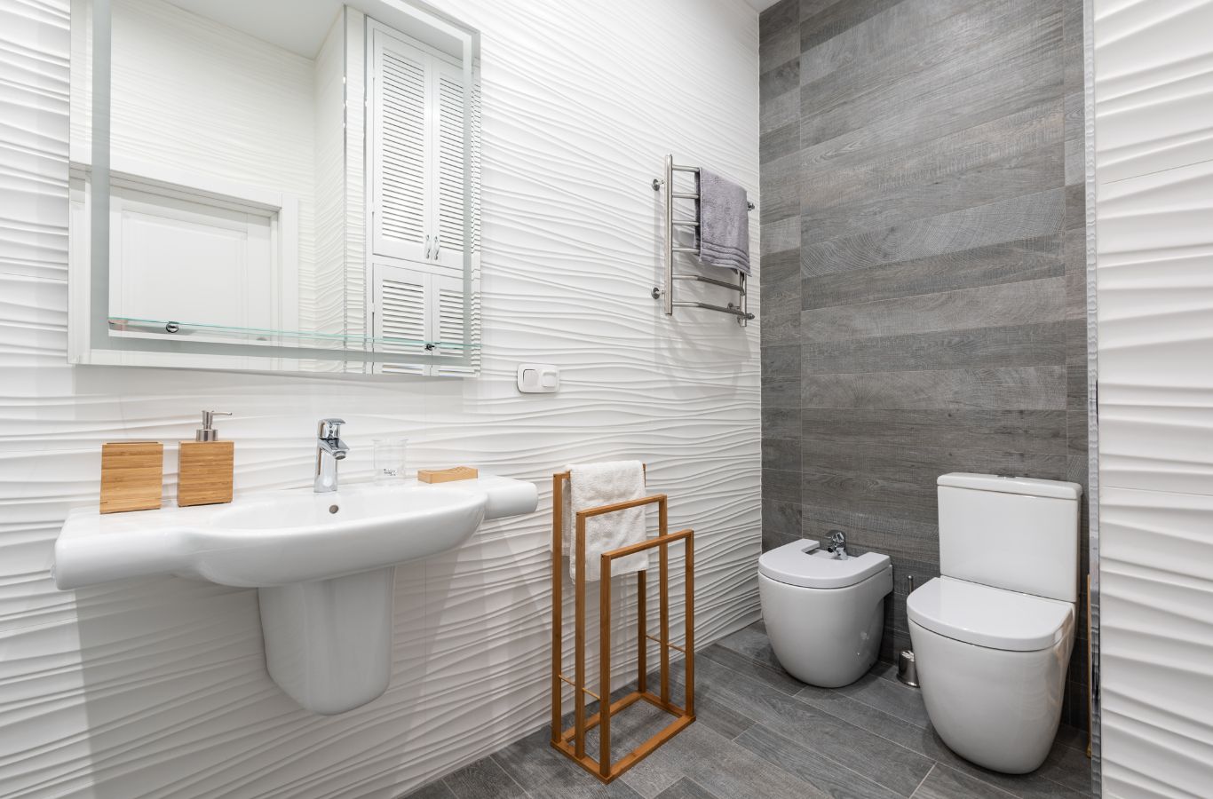 A Sunshine Clean Pros expert providing house cleaning services in Haddonfield, NJ, shown scrubbing a pristine bathroom to reflect professionalism and trust. House Cleaning Services near me.